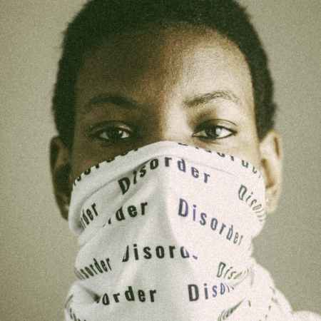 serious black person in balaclava